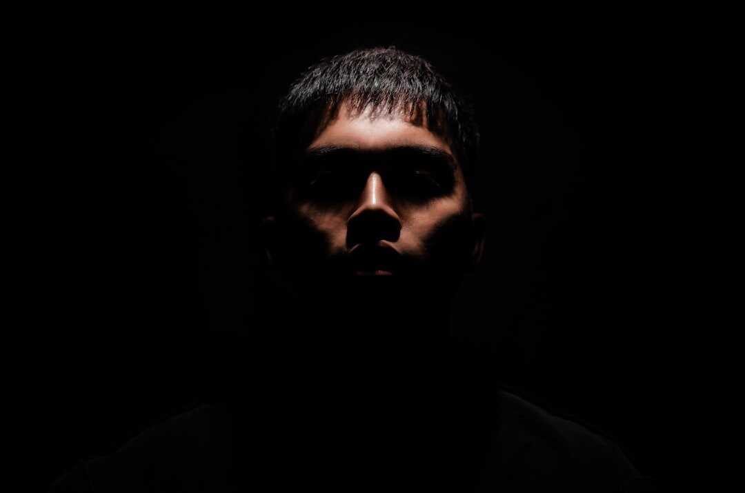 mysterious man in shadows