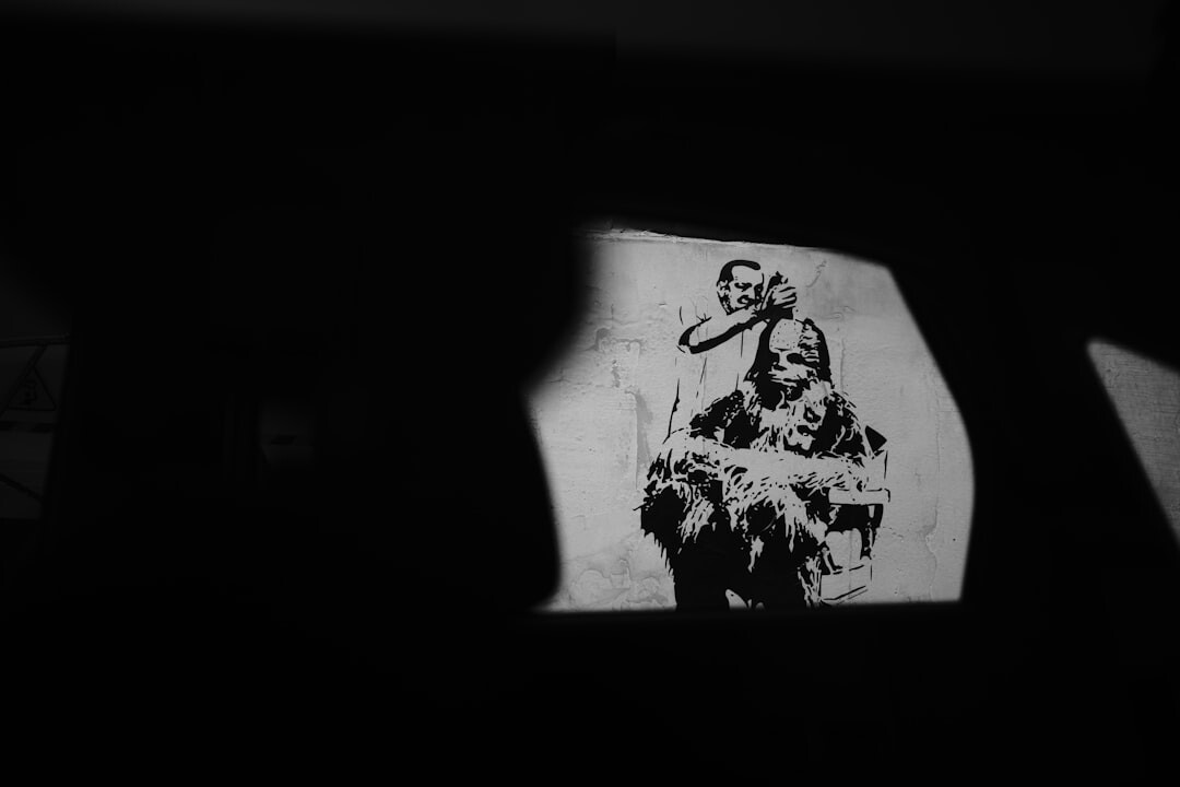 Portrait of a middle-aged Croatian male writer in a dark study